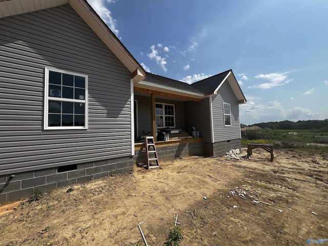 exterior space featuring crawl space