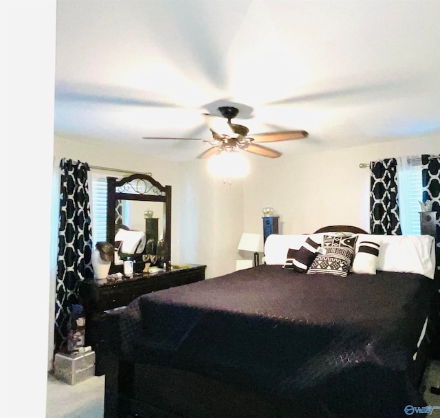 bedroom featuring ceiling fan and carpet floors