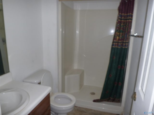 2308 County Road 458, Fort Payne, AL 35968 - bathroom featuring a stall shower, vanity, and toilet