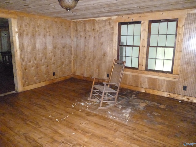 2308 County Road 458, Fort Payne, AL 35968 - spare room featuring hardwood / wood-style flooring and wood walls