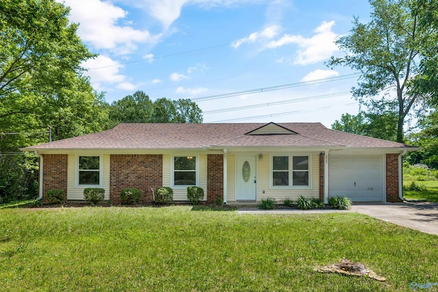 ranch-style home with roof with shingles, driveway, a front yard, and a garage