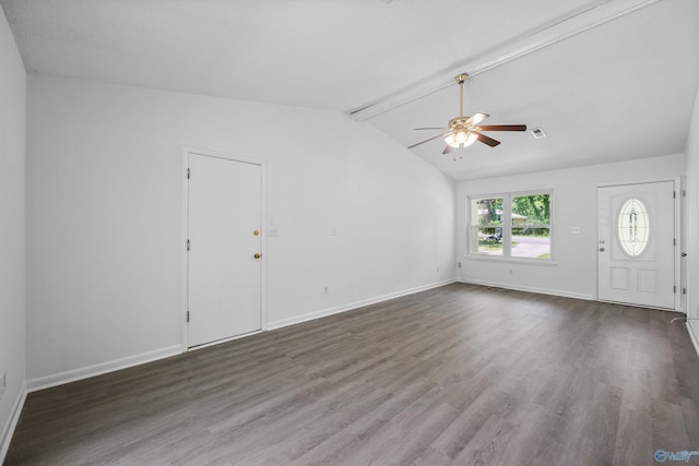 unfurnished living room featuring ceiling fan, visible vents, wood finished floors, baseboards, and vaulted ceiling with beams