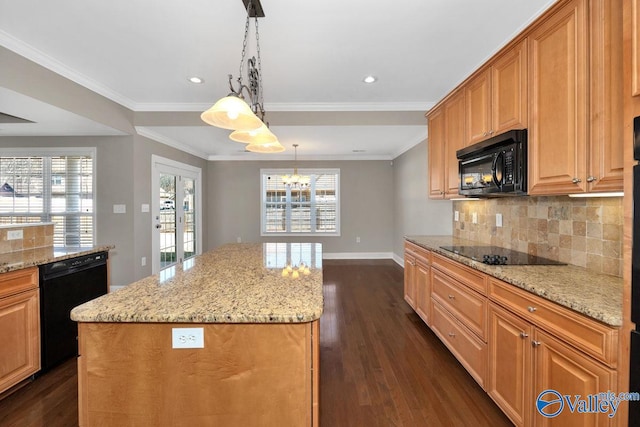 kitchen featuring black appliances, a kitchen island, dark wood finished floors, decorative backsplash, and baseboards