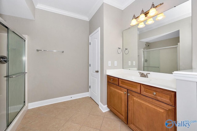 bathroom featuring tile patterned floors, ornamental molding, a shower stall, baseboards, and vanity