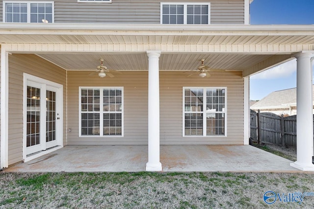 view of patio / terrace featuring a ceiling fan and fence