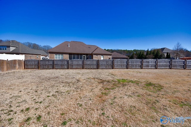 view of yard featuring a fenced backyard