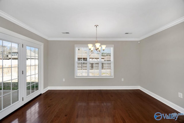 unfurnished dining area with dark wood finished floors, baseboards, visible vents, and a chandelier