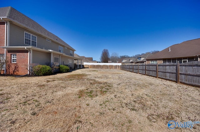 view of yard featuring fence