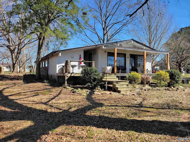 view of front of home featuring covered porch