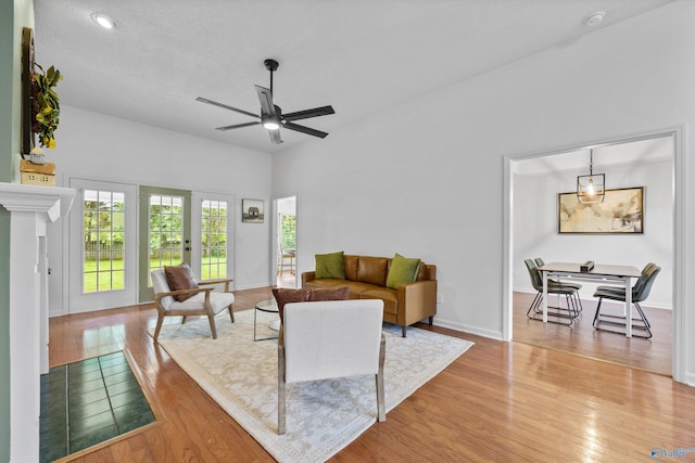 138 Spring Farm Rd, Huntsville, AL 35811 - living room with light wood-style floors and a ceiling fan