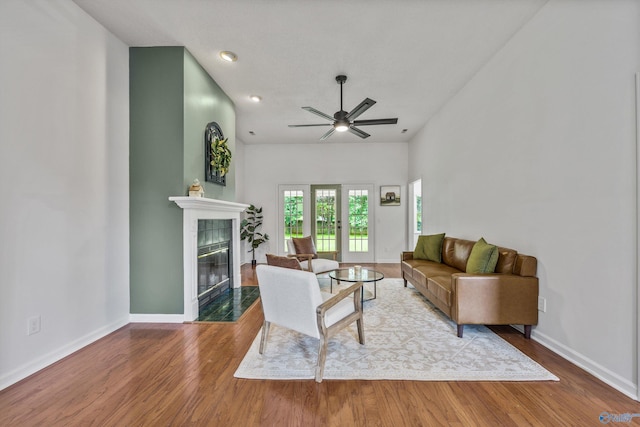138 Spring Farm Rd, Huntsville, AL 35811 - living area with wood finished floors, a fireplace, ceiling fan, and recessed lighting
