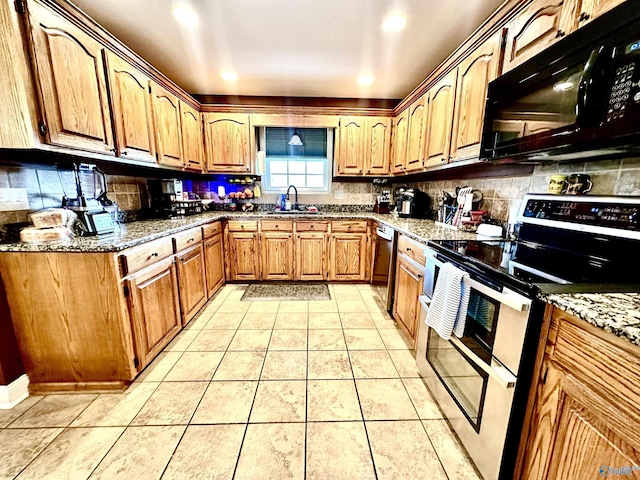 175 County Road 23, Leesburg, AL 35983 - kitchen featuring appliances with stainless steel finishes, a sink, decorative backsplash, stone counters, and light tile patterned flooring