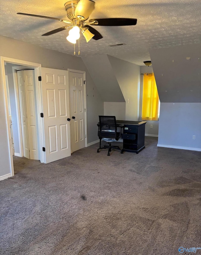 office area featuring carpet, baseboards, and a textured ceiling