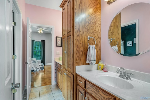 152 W Dr, Fyffe, AL 35971 - bathroom featuring vanity, tile patterned floors, and a ceiling fan