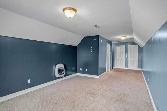 152 W Dr, Fyffe, AL 35971 - bonus room featuring lofted ceiling, carpet floors, baseboards, and heating unit