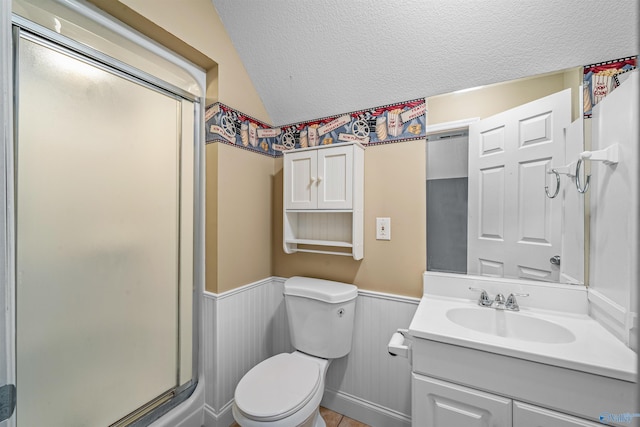 152 W Dr, Fyffe, AL 35971 - bathroom featuring a textured ceiling, a shower stall, a wainscoted wall, toilet, and vanity