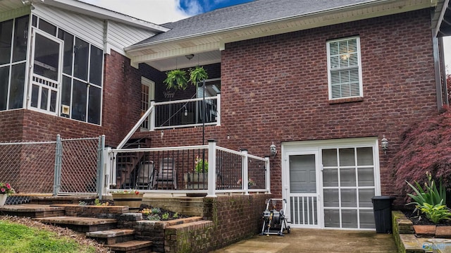 152 W Dr, Fyffe, AL 35971 - rear view of house with brick siding and a shingled roof