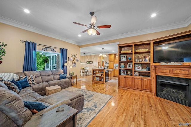 152 W Dr, Fyffe, AL 35971 - living area with a ceiling fan, a glass covered fireplace, light wood-style floors, recessed lighting, and ornamental molding