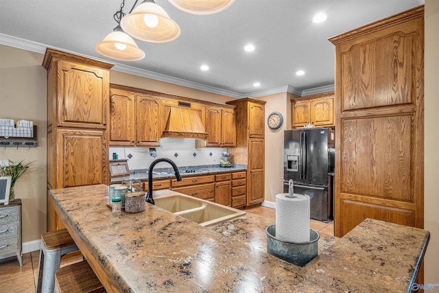 152 W Dr, Fyffe, AL 35971 - kitchen featuring black refrigerator with ice dispenser, a sink, brown cabinetry, recessed lighting, and ornamental molding