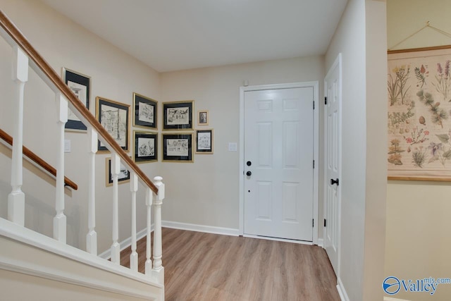 foyer entrance featuring light hardwood / wood-style floors