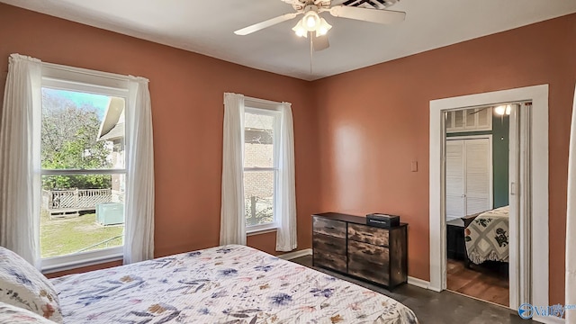 bedroom featuring a ceiling fan and baseboards