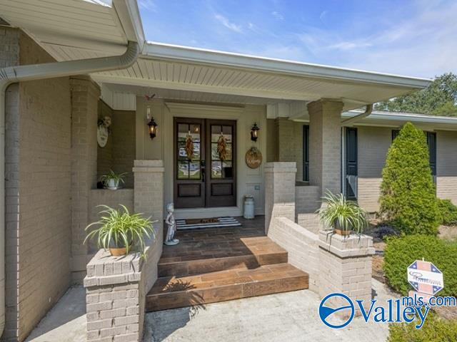 entrance to property with a porch