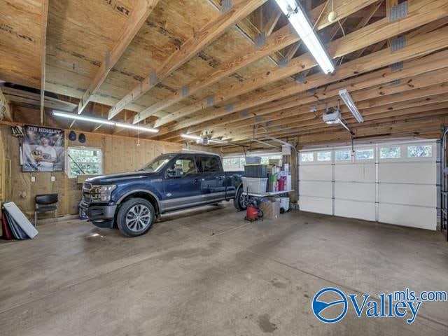 garage featuring a garage door opener
