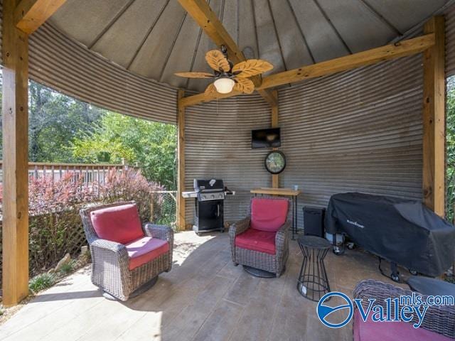 view of patio / terrace featuring area for grilling and ceiling fan