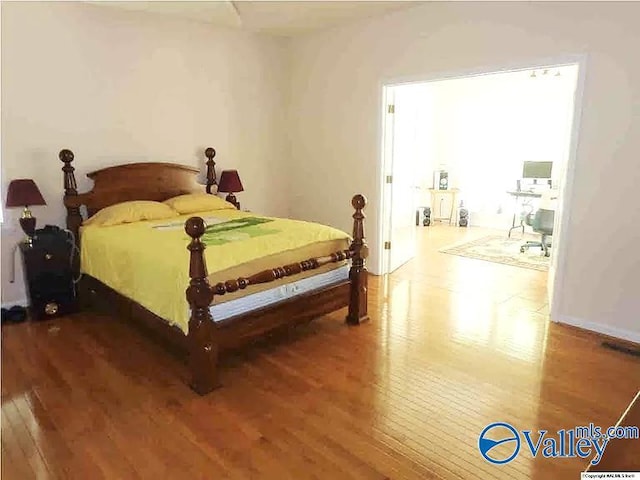 430 Timber Trl, Ashville, AL 35953 - bedroom with wood finished floors and an office area