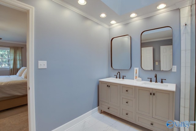 bathroom with vanity and crown molding