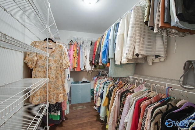 walk in closet featuring wood-type flooring