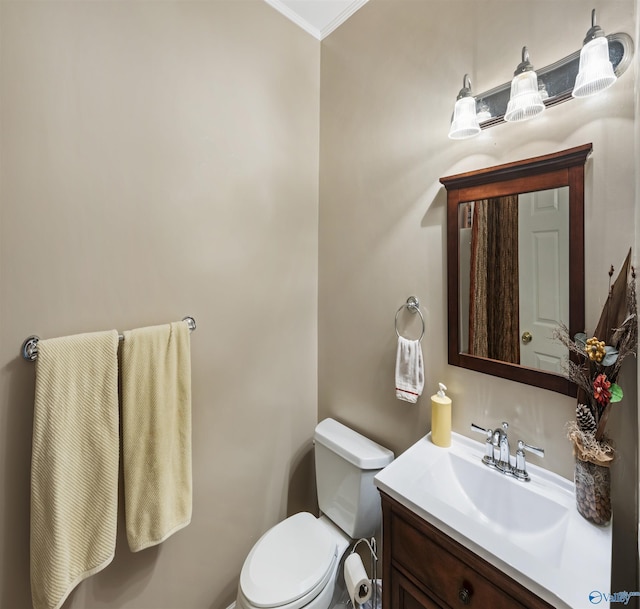 bathroom with toilet and vanity