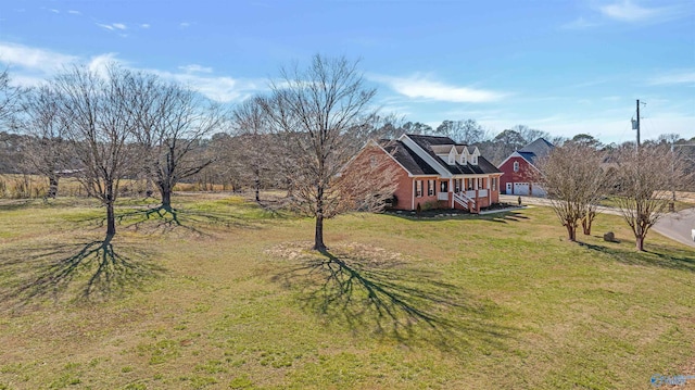 exterior space featuring a front lawn