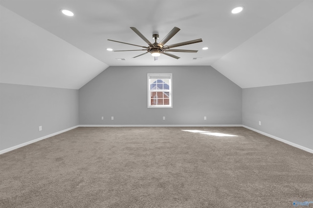 bonus room featuring ceiling fan, carpet floors, and lofted ceiling