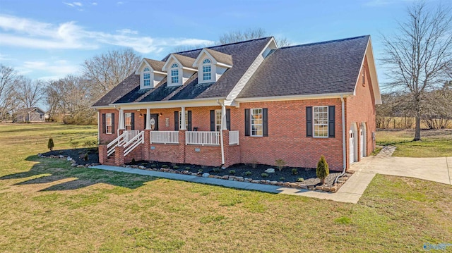 cape cod-style house with a front yard and a porch