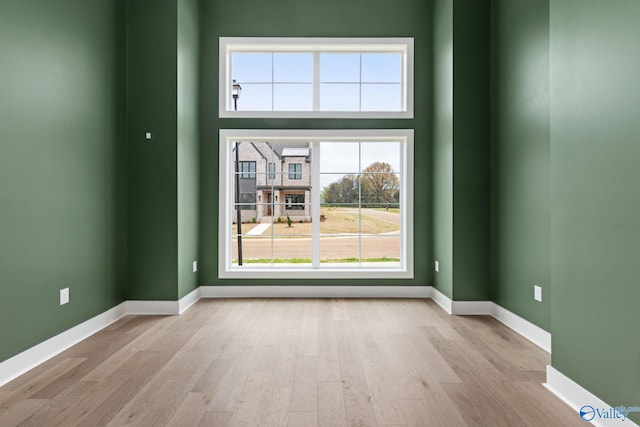 201 Fame Ave, Tuscumbia, AL 35674 - unfurnished room with baseboards and wood finished floors
