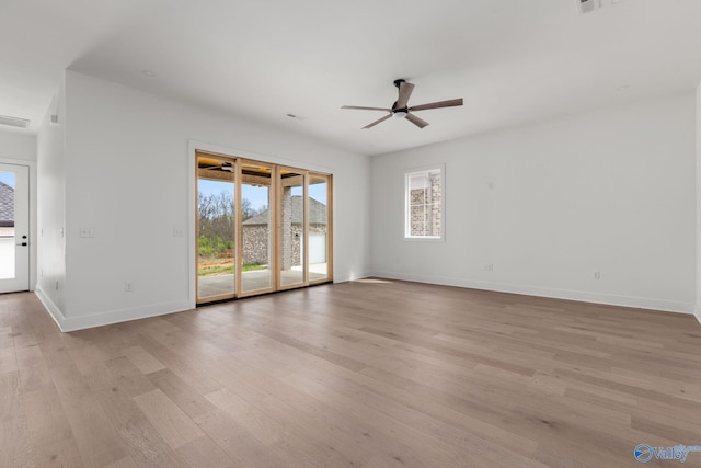201 Fame Ave, Tuscumbia, AL 35674 - empty room with baseboards, ceiling fan, light wood finished floors, and visible vents