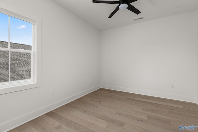 201 Fame Ave, Tuscumbia, AL 35674 - unfurnished room with visible vents, baseboards, ceiling fan, and light wood-type flooring