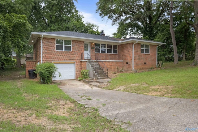 101 Arcade St, Gadsden, AL 35901 - view of front facade with concrete driveway, a garage, a front yard, brick siding, and a chimney