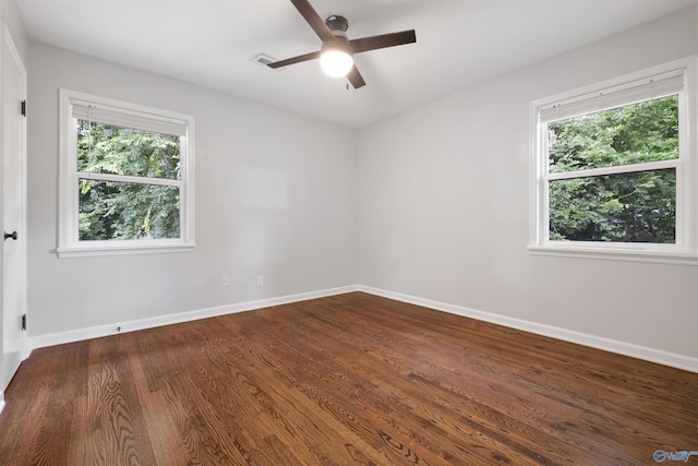 101 Arcade St, Gadsden, AL 35901 - empty room with a ceiling fan, plenty of natural light, and dark wood-type flooring