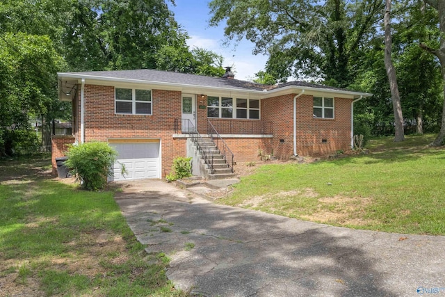 101 Arcade St, Gadsden, AL 35901 - single story home with asphalt driveway, an attached garage, brick siding, and a front lawn