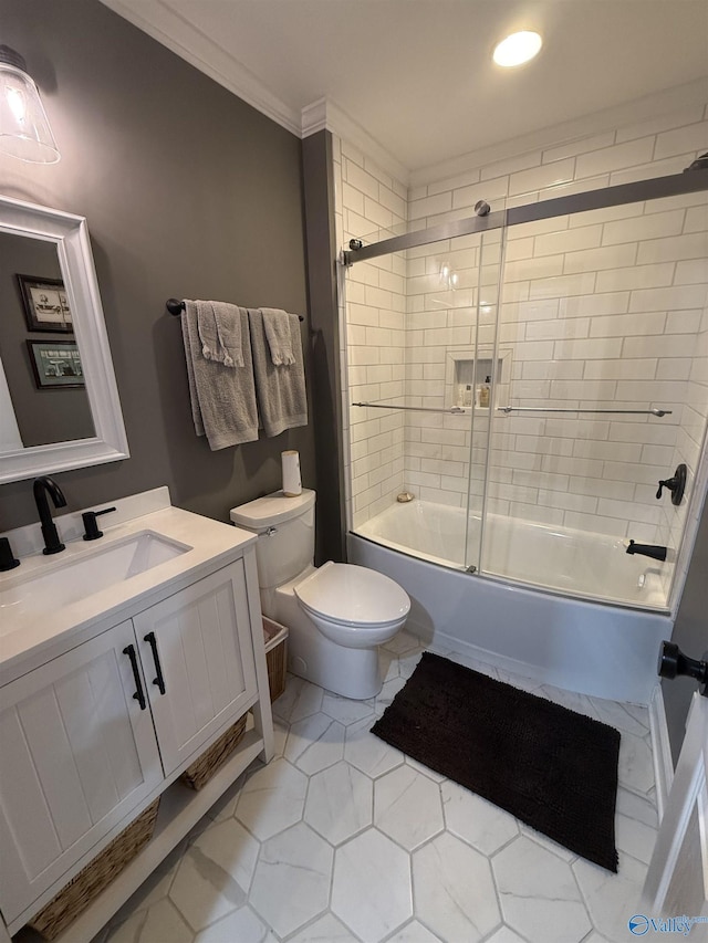 full bath with ornamental molding, shower / bath combination with glass door, vanity, and toilet