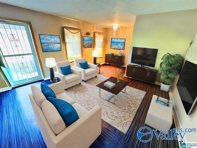 living room with hardwood / wood-style flooring