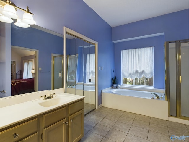 bathroom featuring vanity, a healthy amount of sunlight, plus walk in shower, and an inviting chandelier