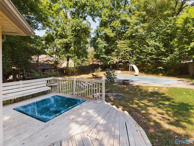 deck featuring a lawn