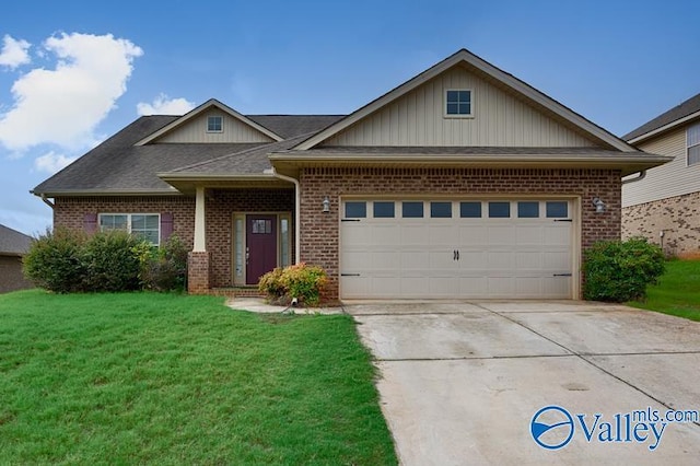 craftsman inspired home with a garage and a front lawn