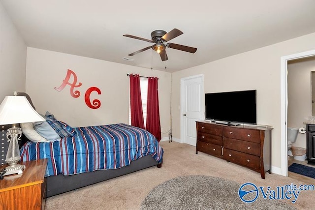 bedroom featuring ceiling fan and light carpet