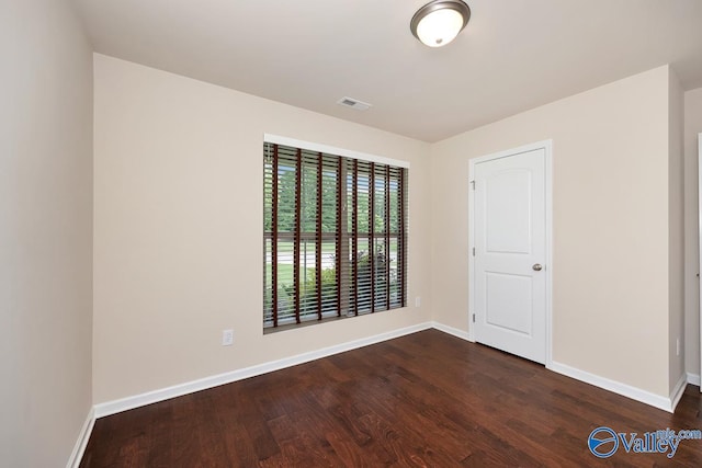 104 Summer Pointe Ln, Madison, AL 35757 - empty room with wood finished floors and baseboards
