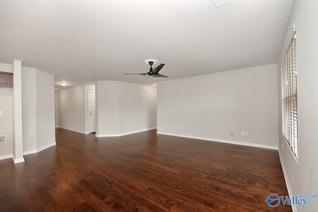 104 Summer Pointe Ln, Madison, AL 35757 - unfurnished living room featuring ceiling fan, dark wood-type flooring, and baseboards