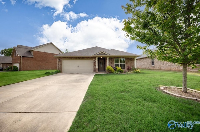 104 Summer Pointe Ln, Madison, AL 35757 - ranch-style house featuring a garage, concrete driveway, brick siding, and a front lawn